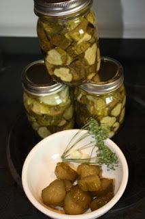 pickles in jars on a black table