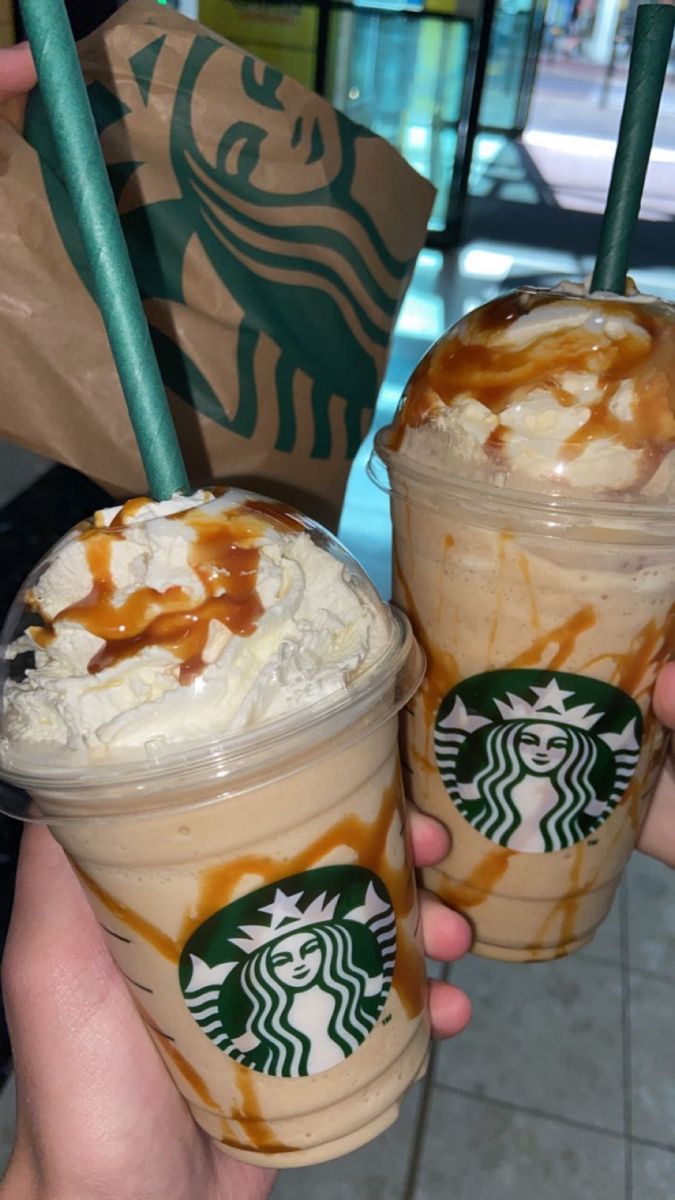 two starbucks drinks with caramel drizzled on the top and one has ice cream in it