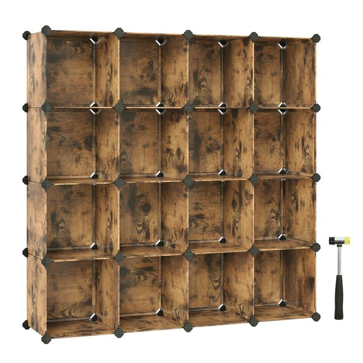 a wooden shelf with several compartments on each side and an iron bar in the middle