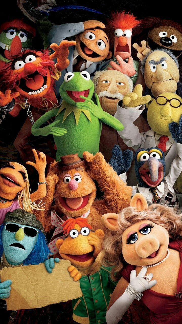 the muppets are all dressed up in costume and posing for a group photo