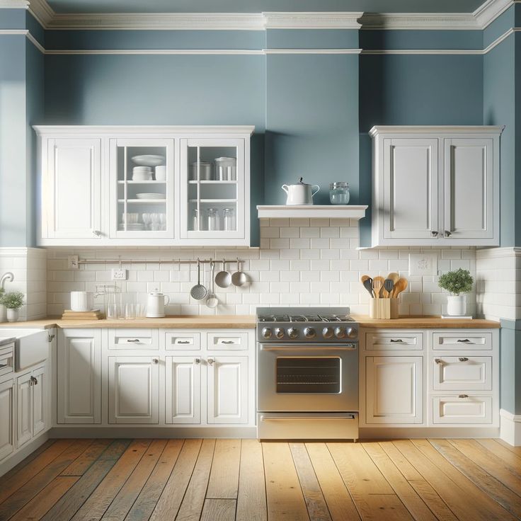 a kitchen with blue walls and white cabinets, wood flooring, and stainless steel appliances