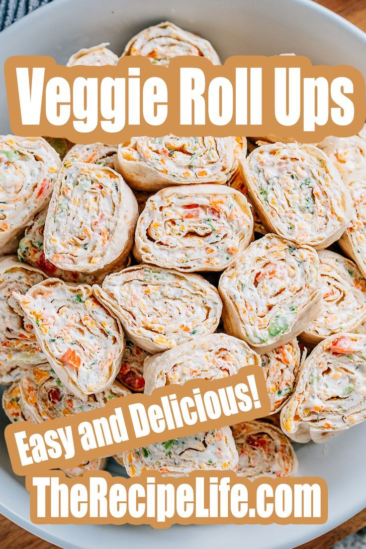 A serving plate these easy appetizers Veggie Roll Ups! Easy Roll Ups Appetizers, Roll Up Lunch Ideas, Easy Pin Wheels Tortilla Rolls, Low Calorie Roll Ups, Snack Wraps Roll Ups, Wrap Rolls Appetizers, Cold Appetizers Pinwheels, Dairy Free Roll Ups, Party Pinwheels Easy