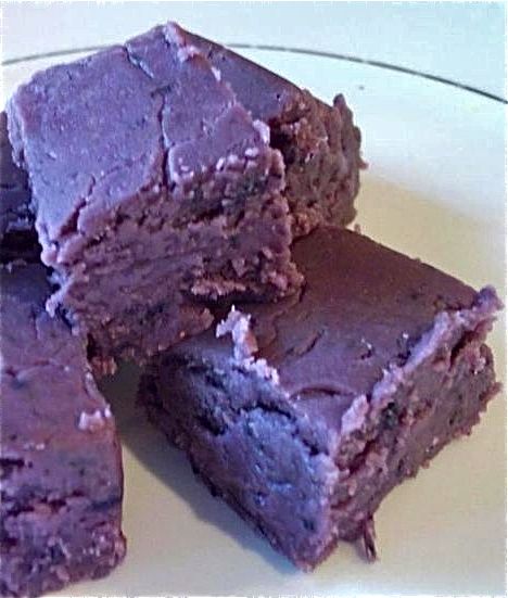 several pieces of chocolate cake on a plate