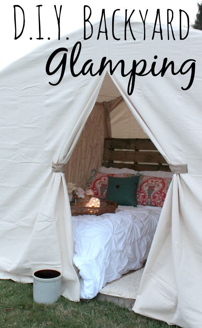 a white tent with the words diy backyard glamping