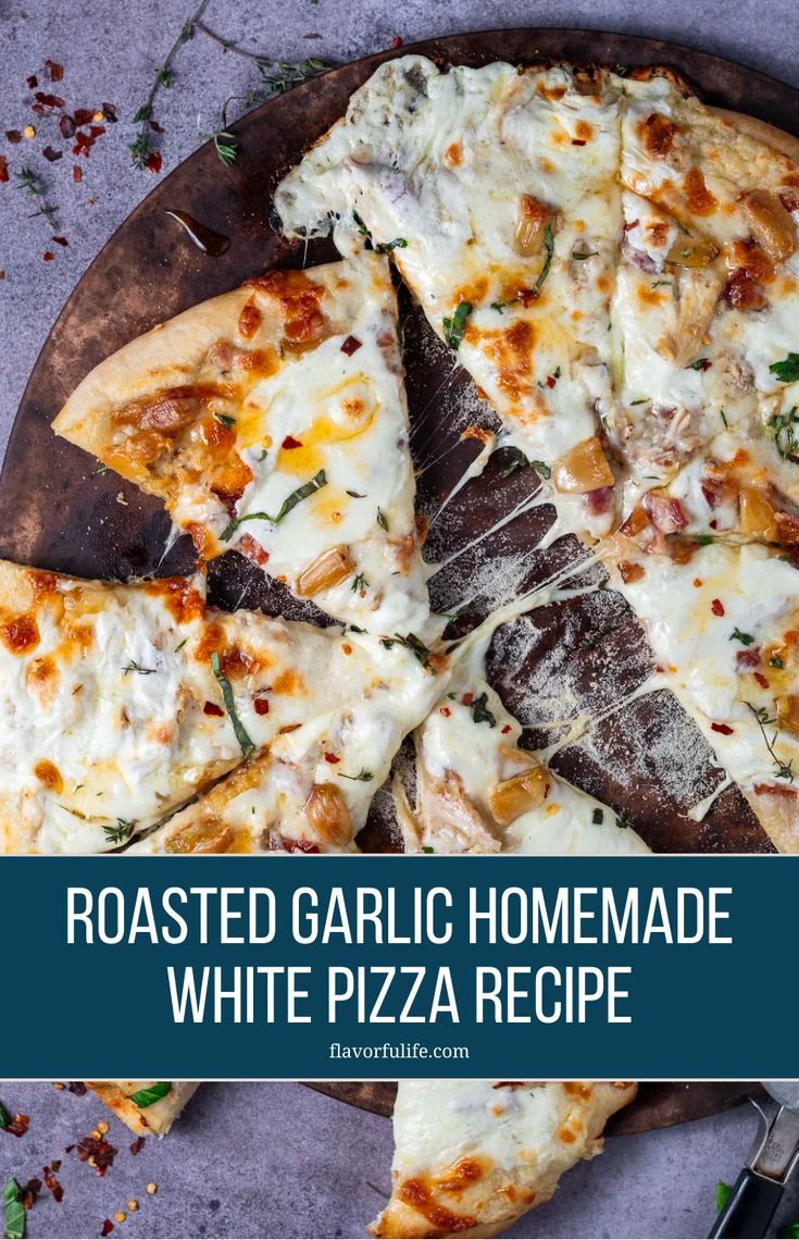 roasted garlic homemade white pizza on a cutting board with text overlay that reads roasted garlic homemade white pizza recipe