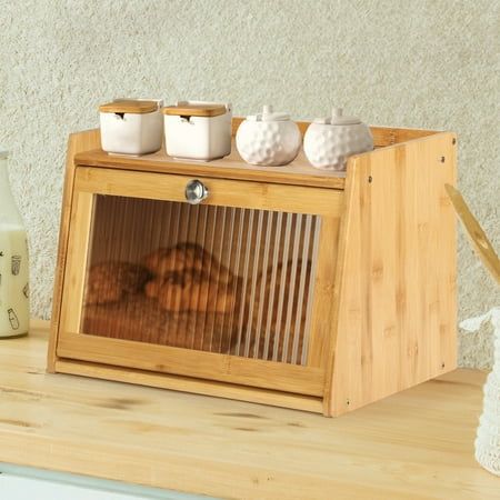 a toaster oven sitting on top of a wooden counter