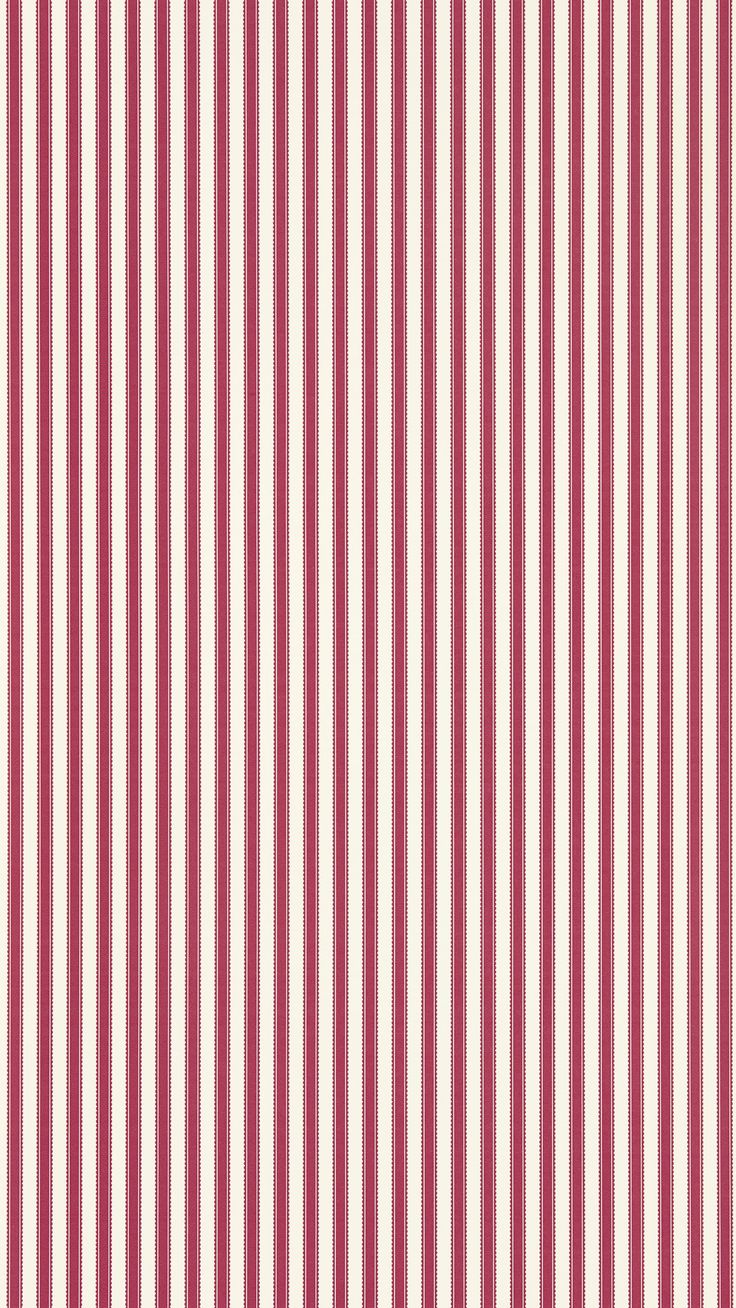 a red and white striped wallpaper with vertical lines on the bottom half of it