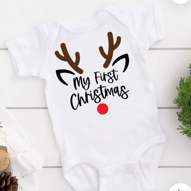 Comes In Black Or White And Other Colors Comment Below Which Color You Would Like . Baby First Christmas Shirt, Christmas Onsies Baby, Cricut Baby Onesie, Baby Onies, Onesie Diy, Christmas Shirts Vinyl, Christmas Onsies, Christmas Baby Onesie, Baby Christmas Onesie