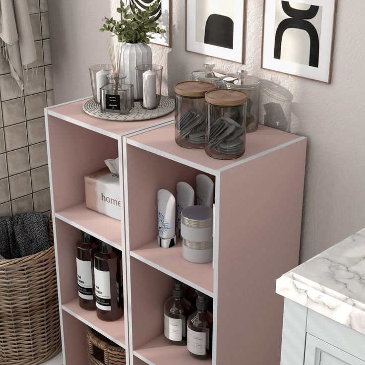 a bathroom with pink shelving and various items on it