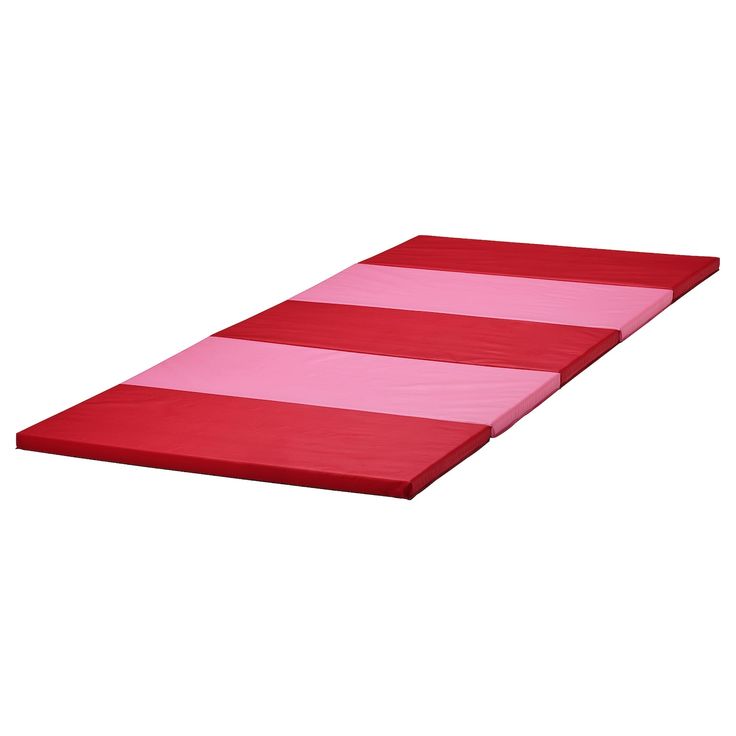 a pink and red striped mat on a white background