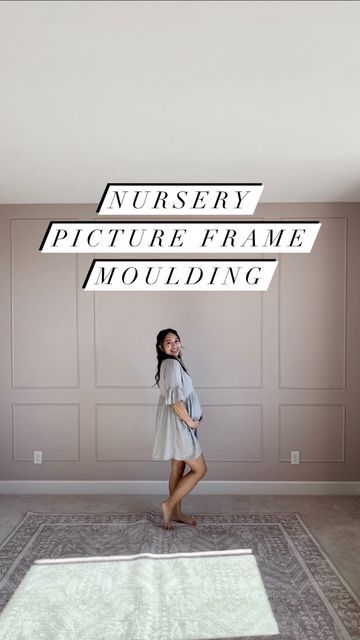 a woman standing in an empty room with the words nursery picture frame moulding above her