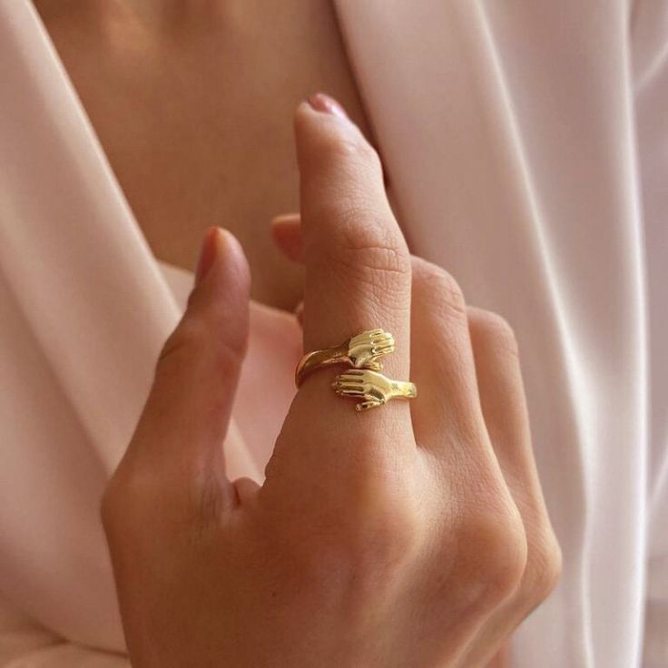 14k Solid Gold Love Hugging Hands Ring, Hug Gold Ring, Yellow Gold Hand Ring, Handmade Ring, Adjustable Gold Ring 💎 PRODUCT DETAILS * Made to order * Gold: Solid 14K Gold * Choice of Gold: Gold ,Rose Gold,White Gold * Weight of the ring: Approx. 2.60 ~ 2.80 gr ❗ CUSTOMIZATION Our ring comes in three different gold colours: Rose Gold, White Gold and Yellow Gold. 📦 PACKAGING All items are nicely packaged ready to gift in elegant jewelry boxes. You can also leave a gift message for the recipient Gold Bypass Ring For Gift, Dainty Gold Bypass Ring As Gift, 14k Gold Bypass Ring Gift, 14k Gold Bypass Open Ring Gift, 14k Gold Bypass Ring As Gift, Unique Snake Ring For Weddings, Gold Stackable Bypass Ring As A Gift, Fine Jewelry Open Ring For Mother's Day, 14k Gold Snake Ring Stamped 14k, Perfect For Gift