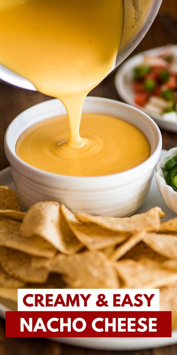 creamy and easy nacho cheese dip is being drizzled over tortilla chips