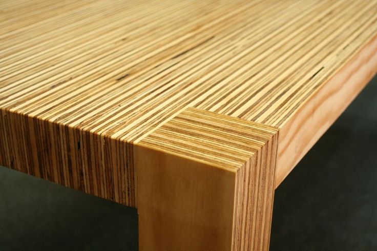 a close up of a wooden table with no one on it or someone else at the top