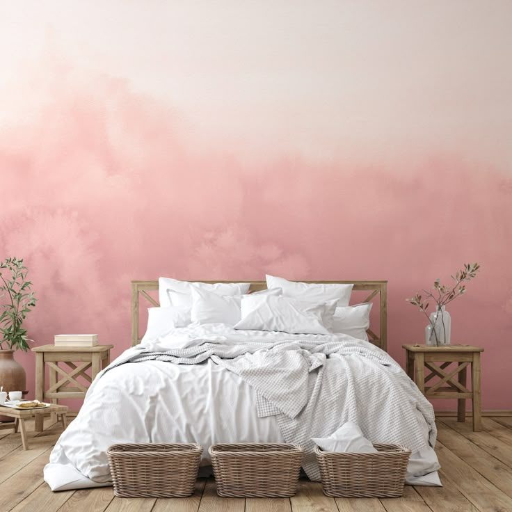 a bedroom with pink walls and white bedding in front of a large painting on the wall