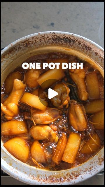 a pot filled with food and the words one pot dish written in front of it