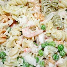 the pasta salad has peas and shrimp in it