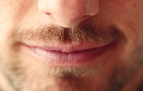 a close up shot of a man's face