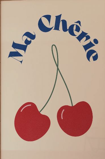 a sign with two cherries hanging from it's sides and the words mr cheeto