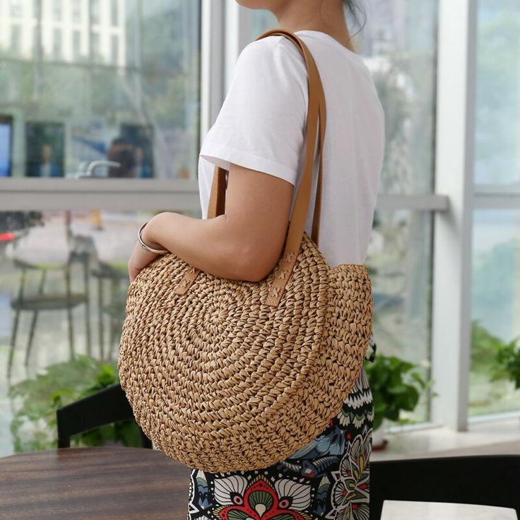 Super fun straw tote bag. Perfect for the beach and walks around town! Cheap Cream Woven Straw Bag, Eco-friendly Handwoven Hobo Bag For Vacation, Trendy Large Capacity Straw Bag For Day Out, Bohemian Hobo Bag With Braided Handles For Beach Season, Casual Jute Shoulder Beach Bag, Casual Jute Shoulder Bag For The Beach, Bohemian Natural Shoulder Bag With Double Handle, Casual Style Large Capacity Natural Fiber Shoulder Bag, Natural Fiber Bags For Day Out