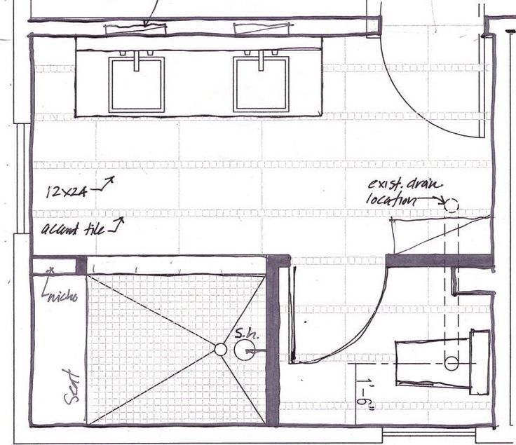 the floor plan for a bathroom with an attached toilet and sink, including a shower stall