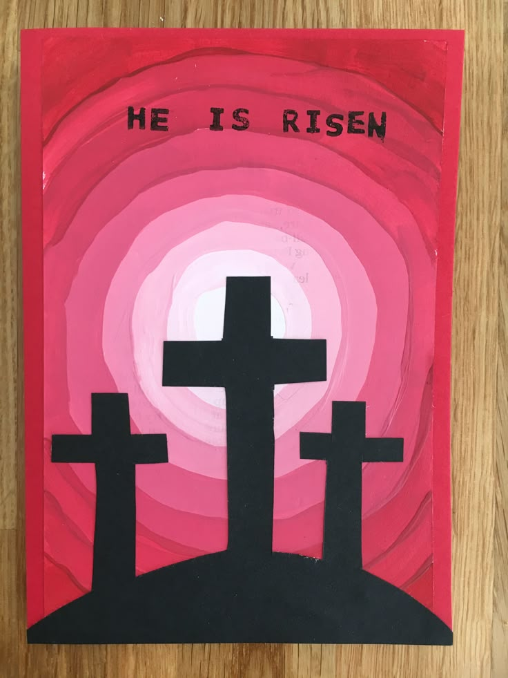 a painting with the words he is risen and three crosses in front of a pink background