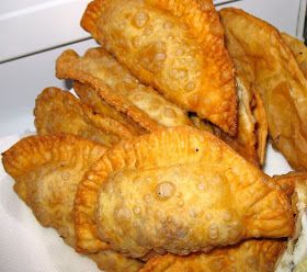 some fried food is on a white plate