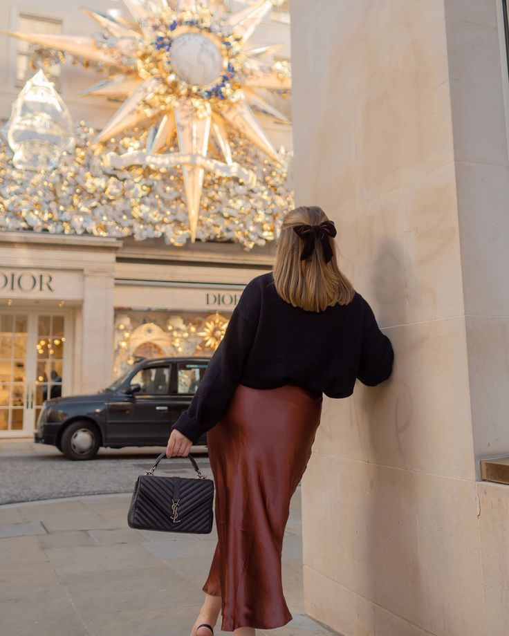 Silk Dress Christmas Outfit, Silk Skirt Christmas Outfit, Brown Christmas Outfit, London Christmas Outfit, Festive Outfits Christmas, Christmas Fashion Photography, Silk Skirt Outfit, Mom Fits, Money Aesthetics