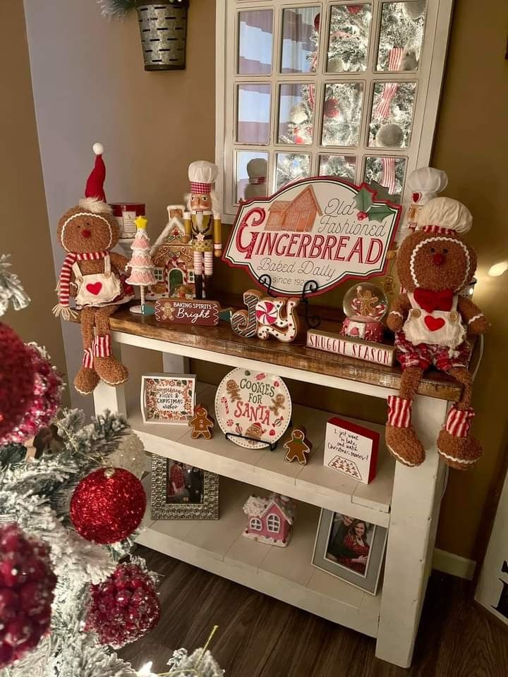 a christmas display with gingerbread cookies and candy