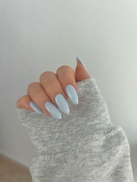 Light Blue And Gray Nails, Cloud Blue Nails, Winter Nails Ice Blue, Garba Nails, Light Blue Almond Acrylic Nails, Icy Blue Nails Winter, Light Blue Almond, Light Blue Almond Nails, Baby Blue Nails With Glitter