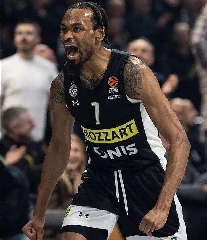 a basketball player with his mouth wide open