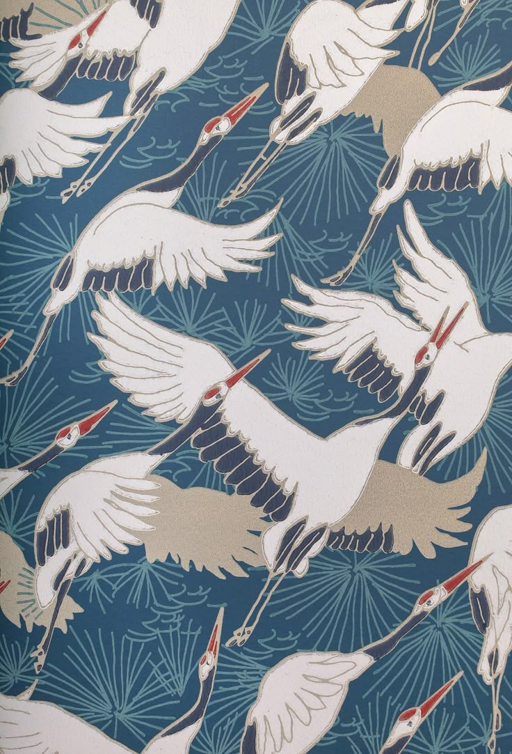 a blue and white wallpaper with birds flying in the air on it's side