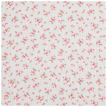 a white fabric with pink flowers on it