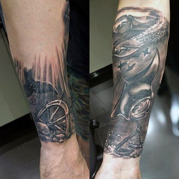 two men with tattoos on their arms and legs