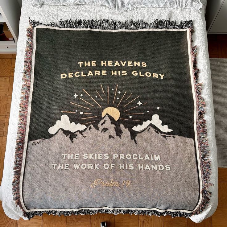 a blanket with the bible written on it