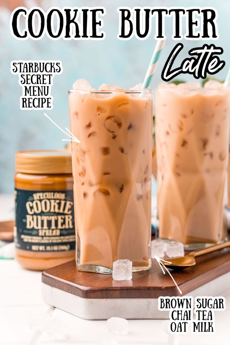 two glasses filled with cookies butter latte on top of a cutting board