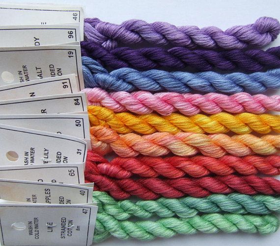 several skeins of multicolored yarn next to each other