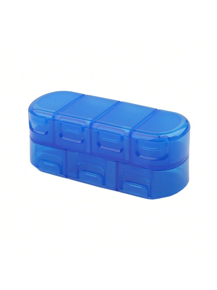 an empty blue plastic pill box on a white background