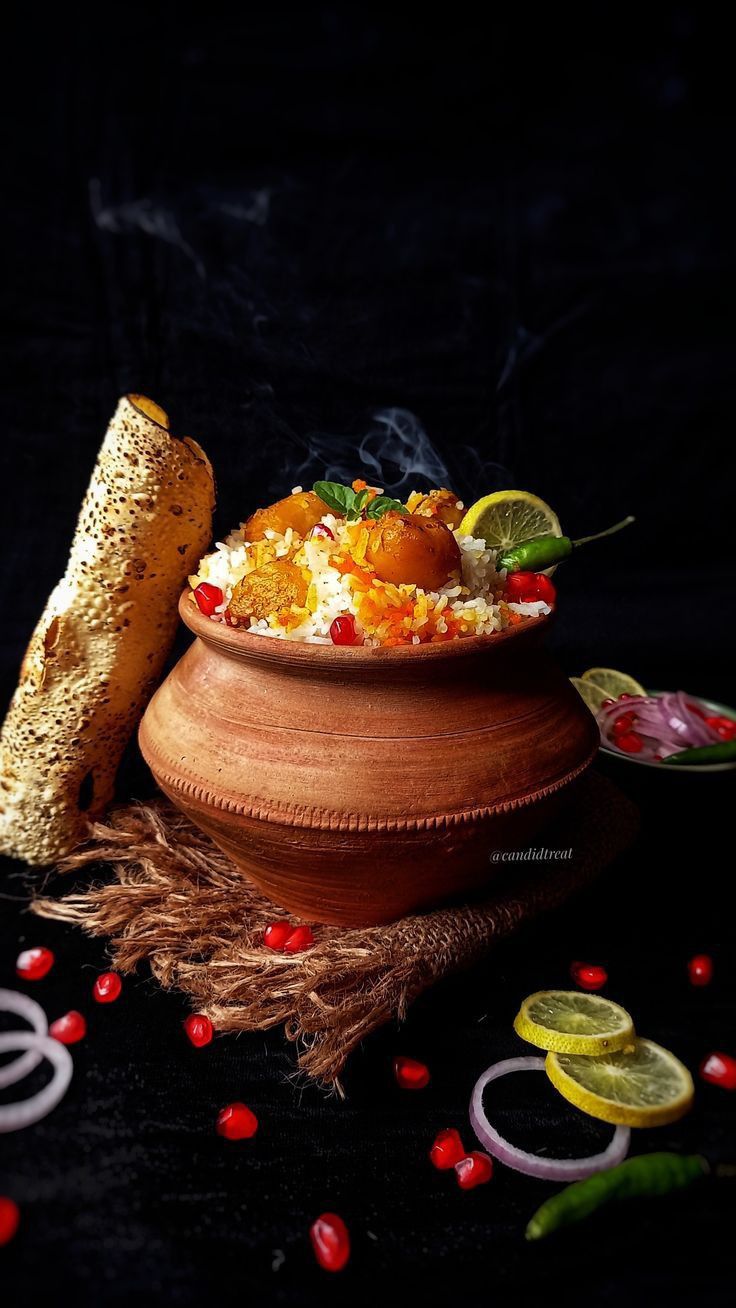 a bowl filled with food sitting on top of a table