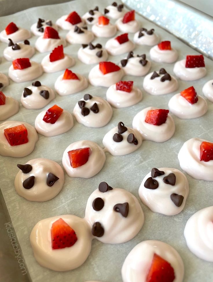 there are many desserts on the tray ready to be baked in the oven and eaten