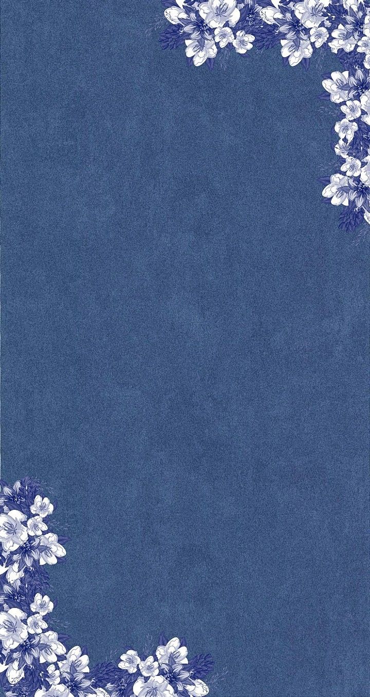 a blue background with white flowers on the bottom and an empty space in the middle