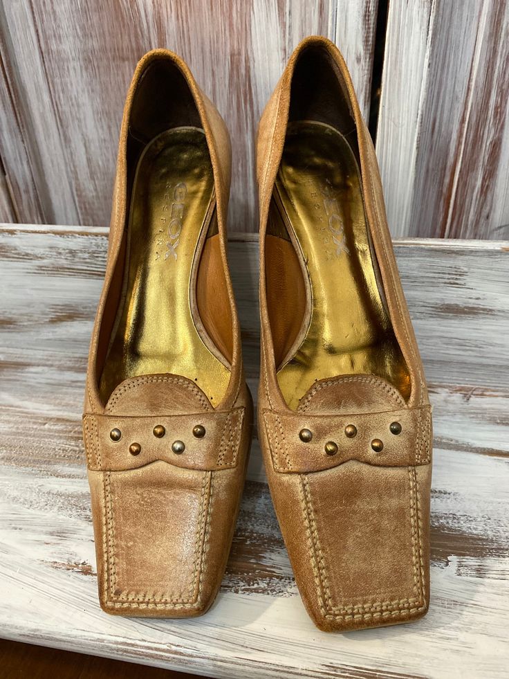 Women's vintage beige leather square toe shoes by Geox respira - size 38 Aged look leather with studs Small heels 1 1/4 inches insole 9 3/4 inches Vintage Beige Flat Heels, Beige Leather Square Toe Court Shoes, Beige Leather Court Shoes With Square Toe, Beige Square Toe Leather Court Shoes, Vintage Leather Shoes With Flat Heel For Fall, Brown Fitted Closed Toe Loafers, Beige Square Toe Heels With Reinforced Heel, Leather Court Shoes With Square Toe And Branded Insole, Vintage Closed Toe Leather Shoes For Spring