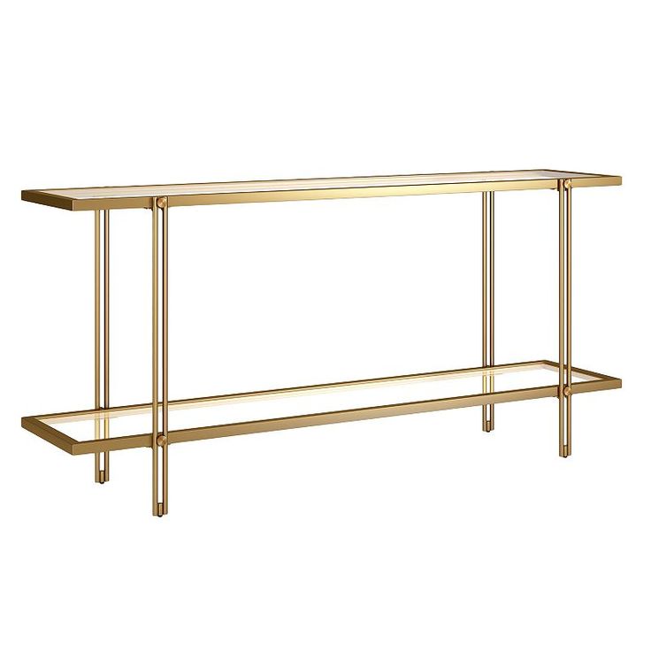 a gold console table with two shelves on each side