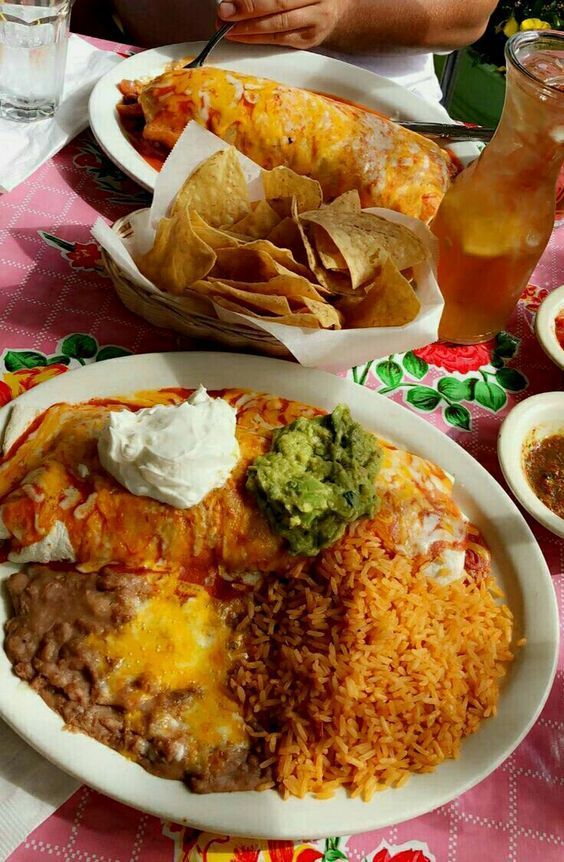 mexican food and drinks are on the table