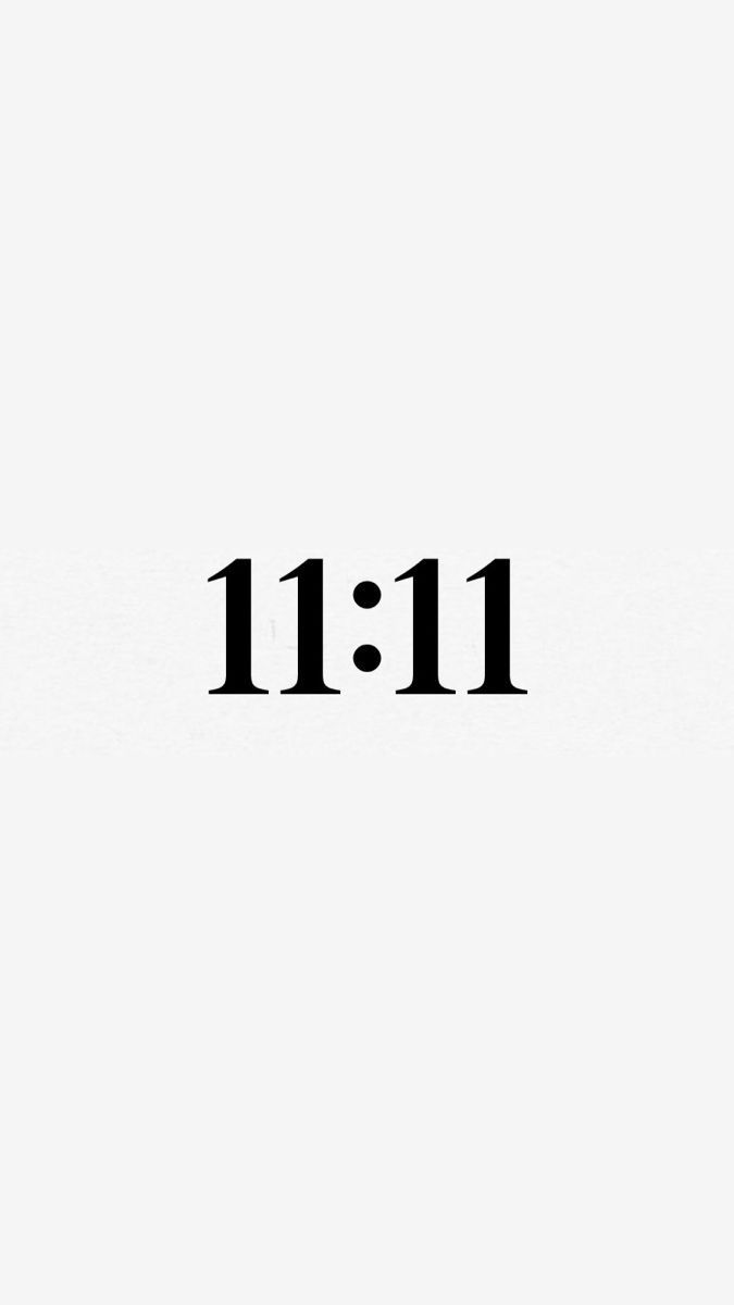 the word 11 11 is written in black on a white background