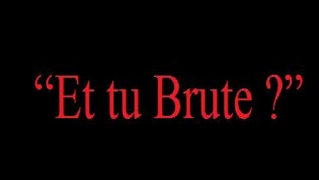 the words et tu brute written in red on a black background