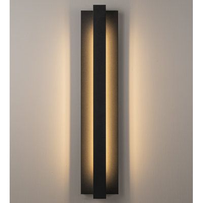 a wall mounted light with two lights on it's side and one is lit up