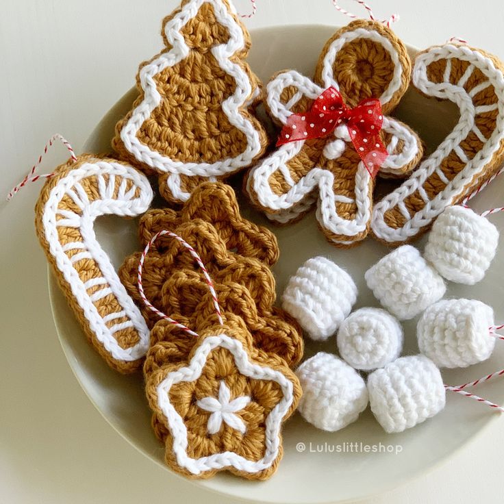 crocheted ginger cookies on a white plate