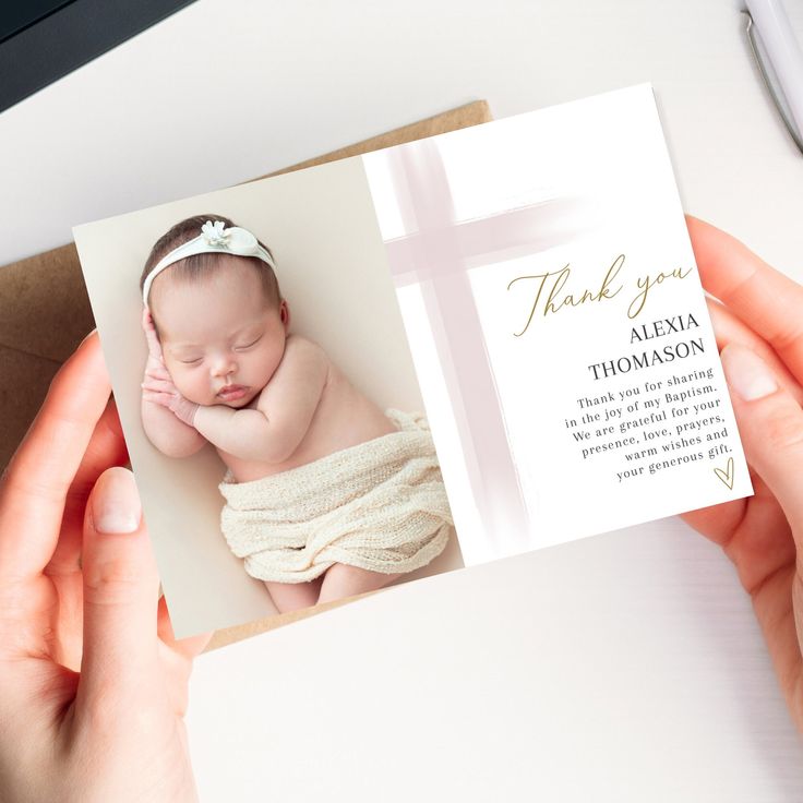 a person holding up a card with a baby on it's back and the words thank you