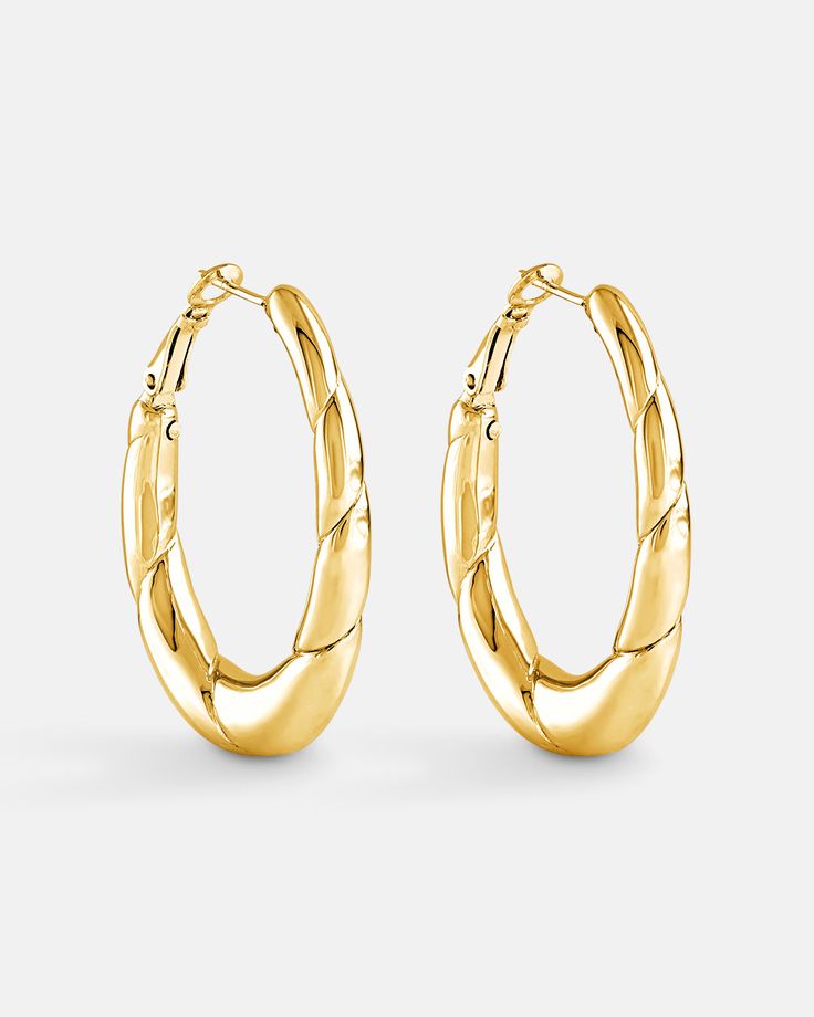 This is the product picture of elongated oval shape hoop earrings plated in gold in sterling silver material A Line Pattern, Chunky Hoop Earrings, Line Pattern, Earring Sale, Line Patterns, Ear Jewelry, Oval Shape, Shop Earrings, Jewelry Pieces